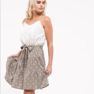 Short dress with lace detailing and ruffle trim